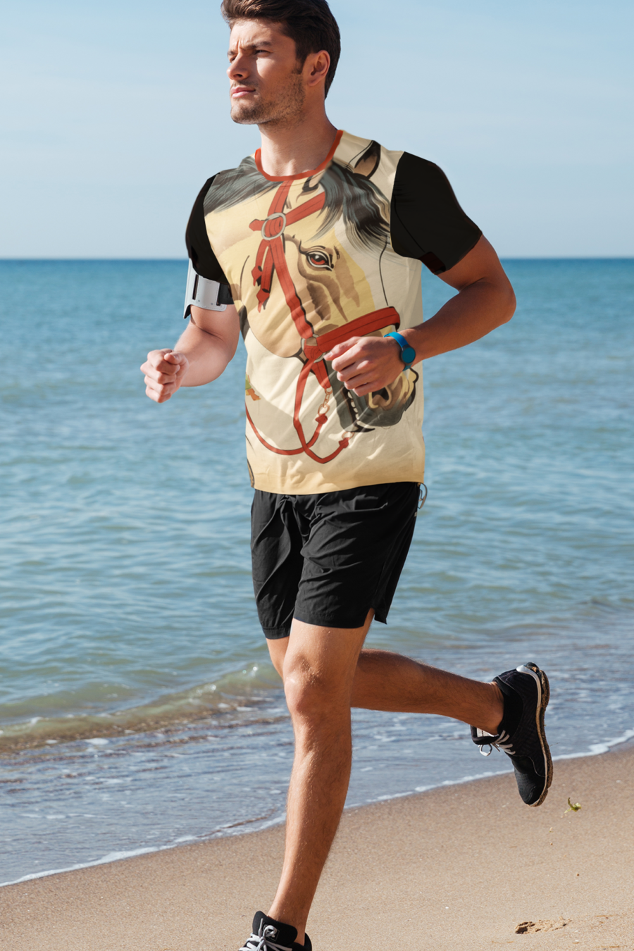Man running on the beach wearing a jersey with an all over print of chinese horse art with black sleeves and red collar.
