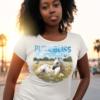 Woman wearing a tshirt with a horse playing in a field