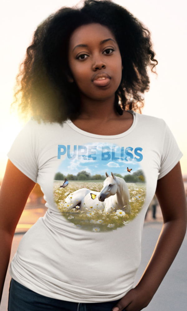 Woman wearing a tshirt with a horse playing in a field