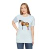 Woman wearing a tshirt with a horse made of a patchwork quilt